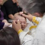 godfather duties at baptism